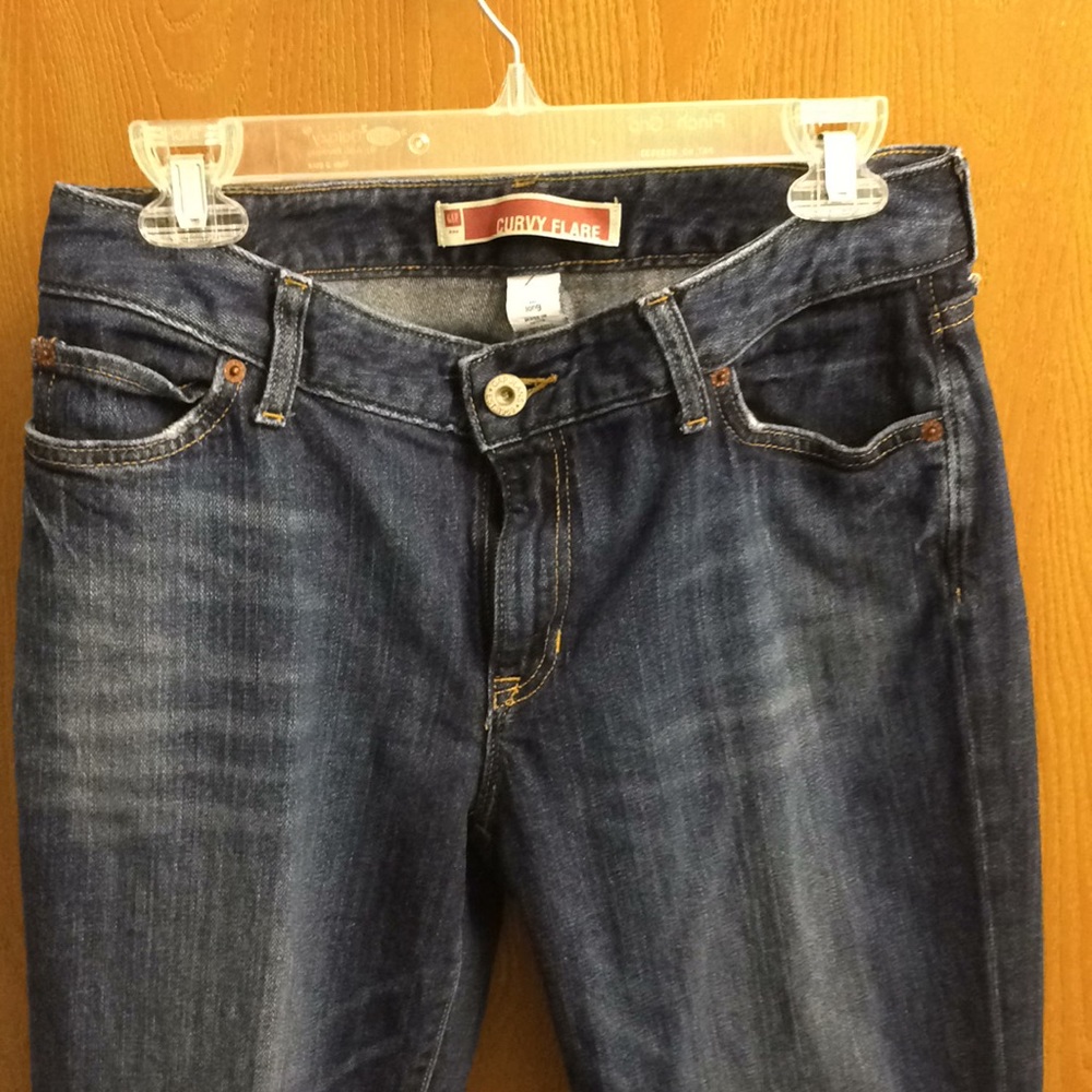 Brand new curvy flare Gap jeans. Dark wash.